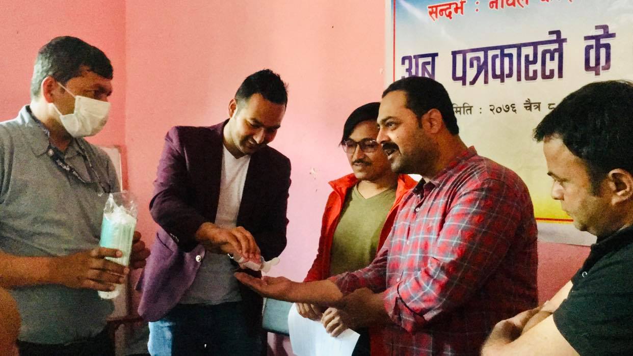 corona hand sanitizer use journalist nuwakot