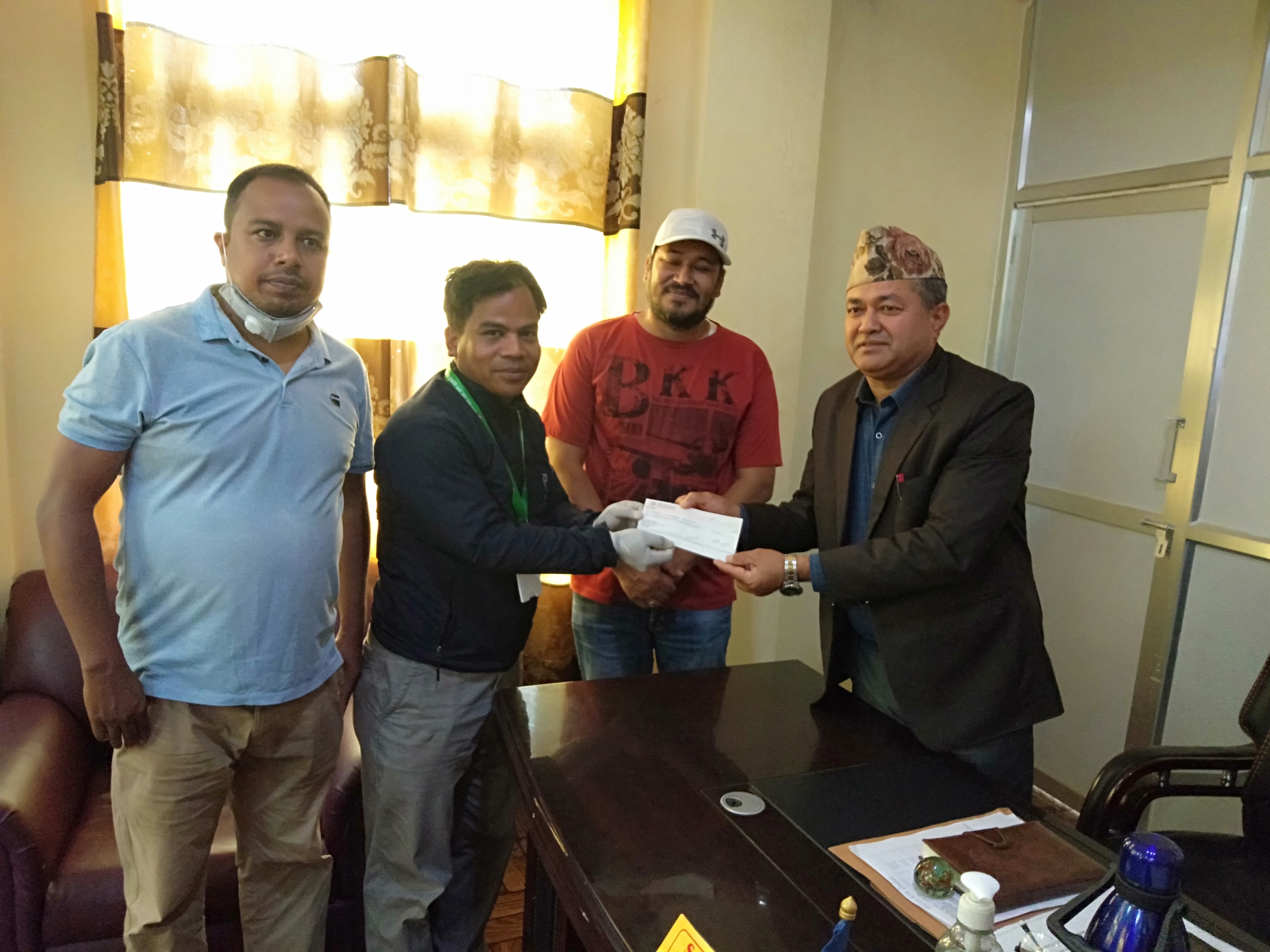 sangam cooperative cash donate to bidur municipality fund in lockdown period corona virus covid 19 nuwakot