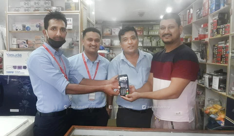 sunrise bank distribute pos machine and qr code to business stakeholder in nuwakot
