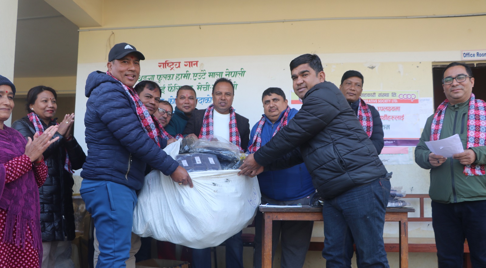 sangam saccos provided to shoes and shocks to united basic school