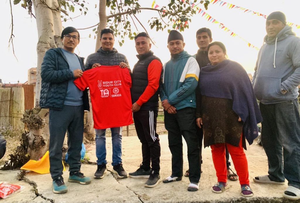 yamaha showroom nuwakot tshirt distributed to bidur city youth club