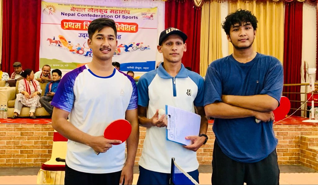 table tenis player saughat and sushant with refree santosh thapa