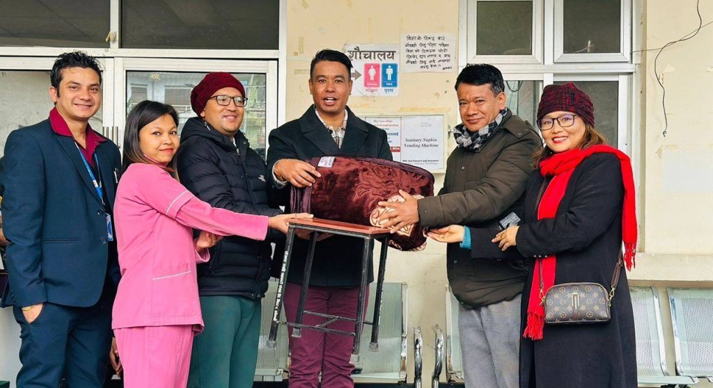 samriddhi cooperative and trishuli church handover blanket, chair and table to trishuli hospital