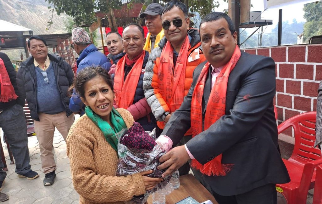 warm clothes distribution and blood donation in Devighat