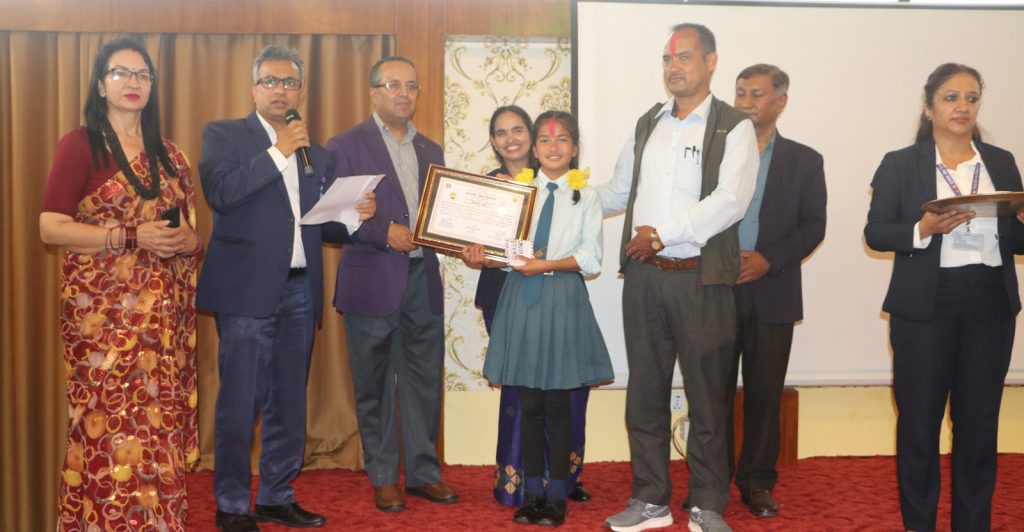 Devika first in debate