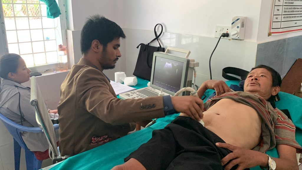 lab technician checking a prostate cancer screening camp in Bidur ward 13 kalyanpur health post
