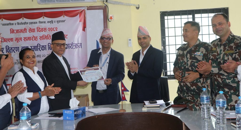 Krishna Prasad Humagain presented with Health Office Chief Award on the occasion of Civil Service Day