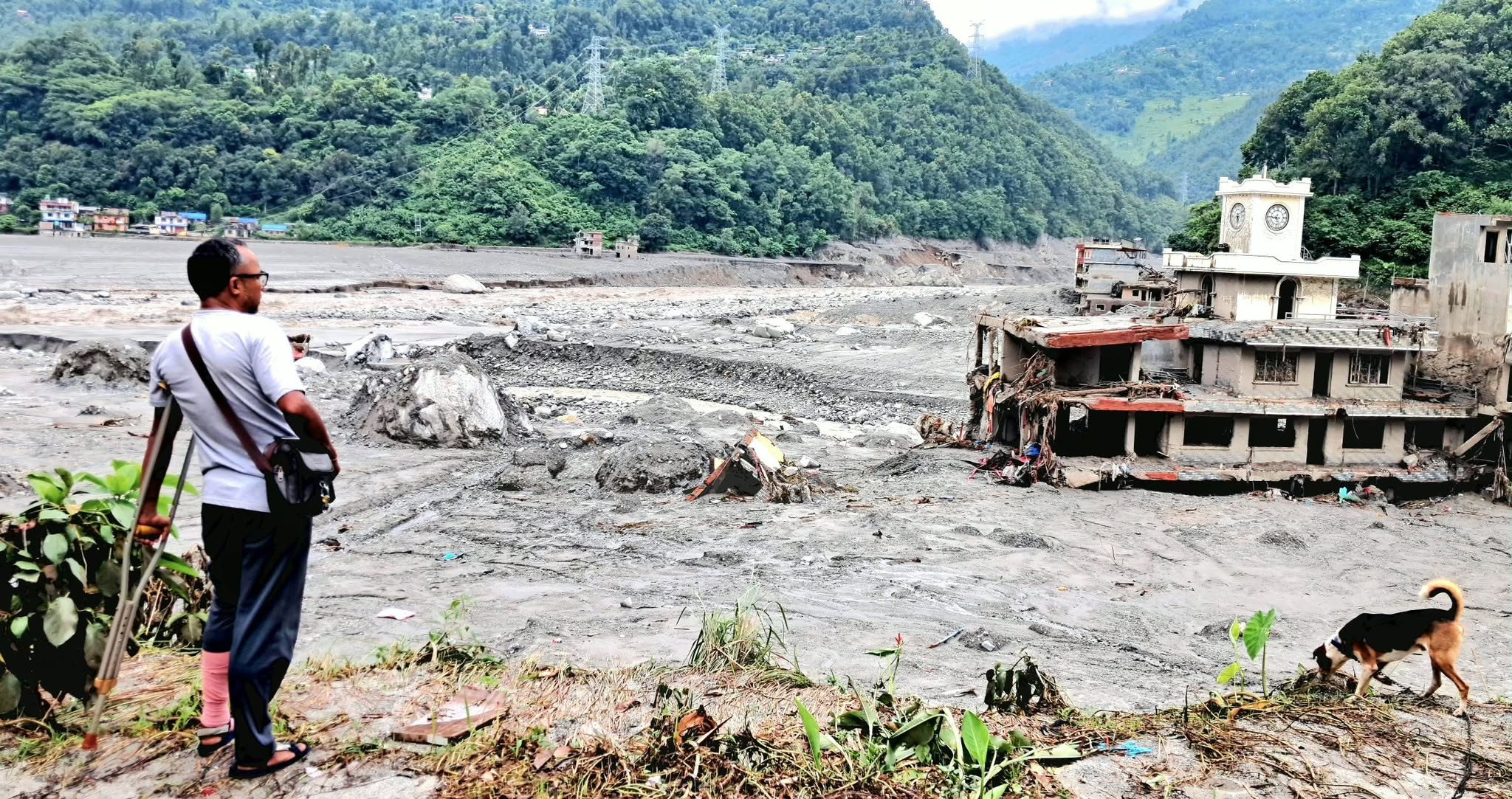 Shashi Dangol Watching the flood damage the house