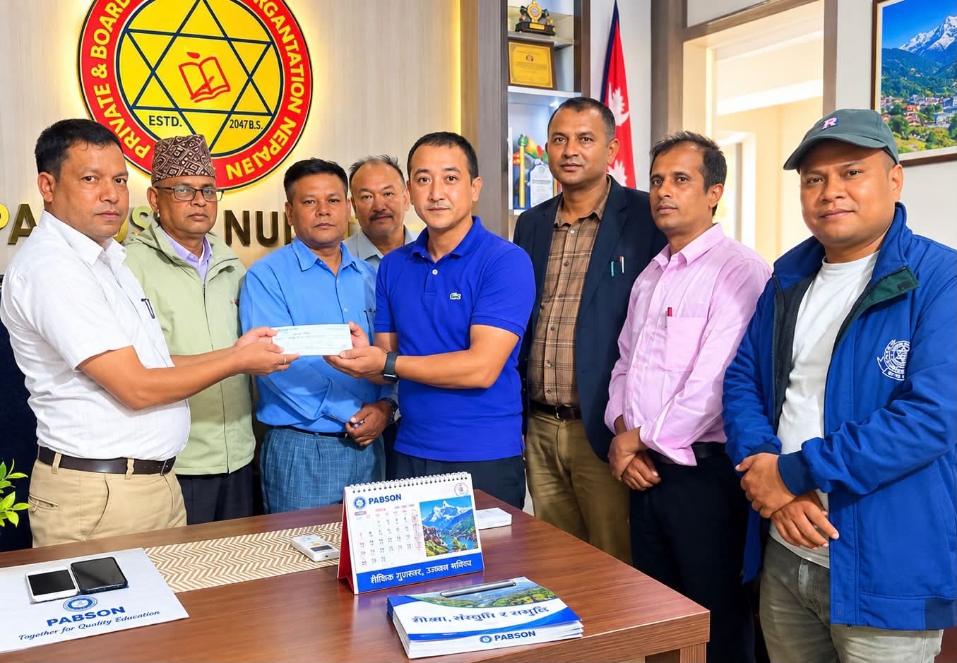 प्याब्सन नुवाकोटद्वारा बाढीपीडित विद्यालय र कर्मचारीलाई राहत वितरण